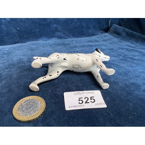 525 - A Beswick figure of a Dalmatian.