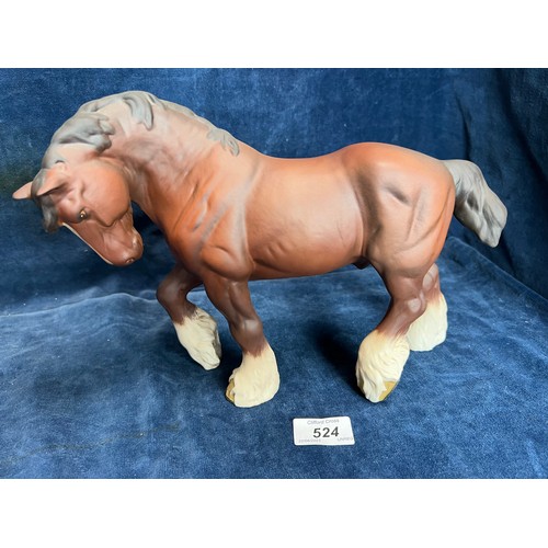 524 - A Beswick figure of a Chestnut Shire Horse.