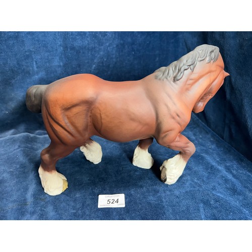 524 - A Beswick figure of a Chestnut Shire Horse.