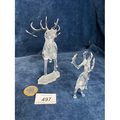 497 - Two Swarovski Crystal figures of Stags.