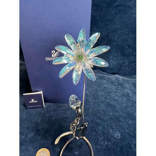 471 - A Swarovski Crystal floral display on chrome stand of 