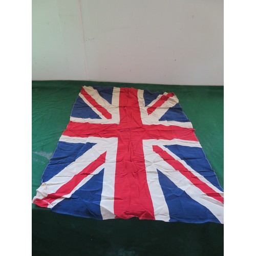 421 - A collection of vintage flags for Great Britain and other countries of various sizes.