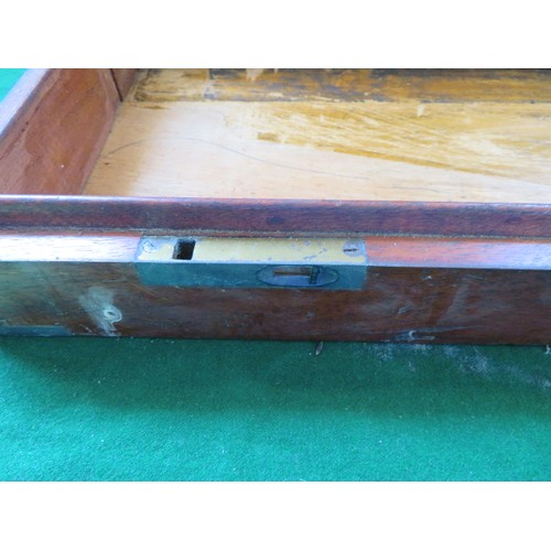 423 - A vintage gun case with brass corners and Bullseye central design (no contents).