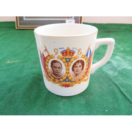 447 - A framed Regimental Coat of Arms and 5 pieces of commemorative ware being 3 mugs, 1 beaker and a bel... 