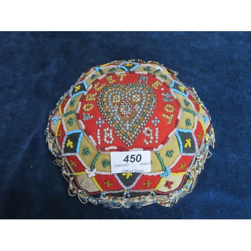 450 - A beadwork cushion with 'Forget-me-not' 1891'.