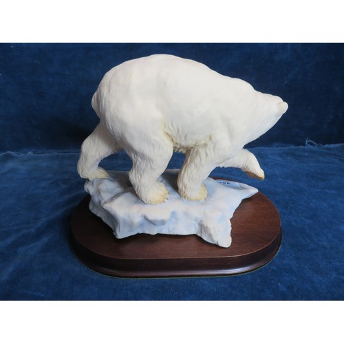 457 - An Aynsley Mastercraft hand-painted figure of a large Polar Bear on wooden base.