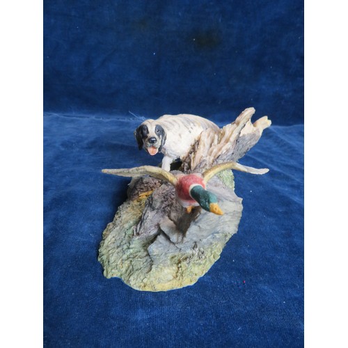 460 - An Aynsley Mastercraft hand-painted figure of a dog chasing a duck.