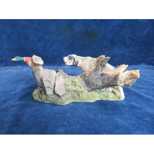 460 - An Aynsley Mastercraft hand-painted figure of a dog chasing a duck.