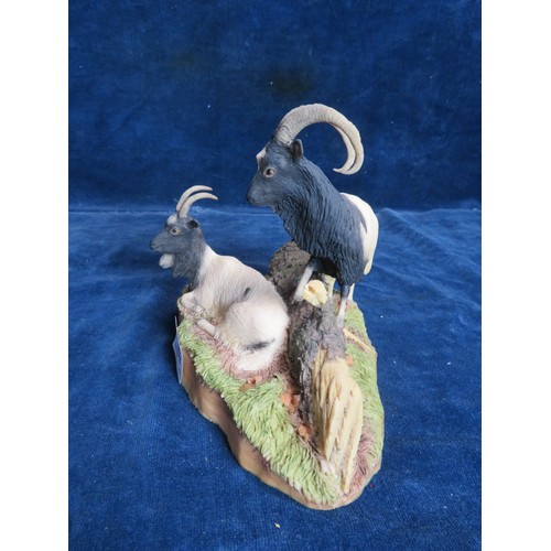 462 - An Aynsley Mastercraft hand-painted figure of two goats.