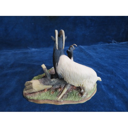 462 - An Aynsley Mastercraft hand-painted figure of two goats.