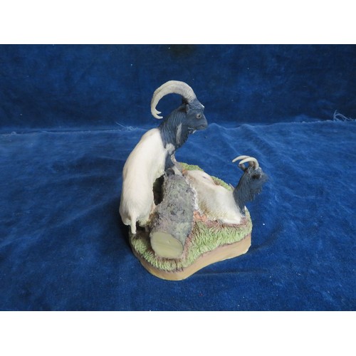 462 - An Aynsley Mastercraft hand-painted figure of two goats.