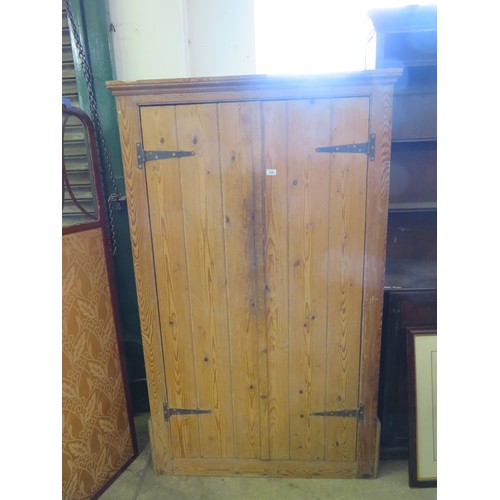 769 - A vintage pine 2-door kitchen cupboard with metal hinges, 3 fitted shelves and a vintage 