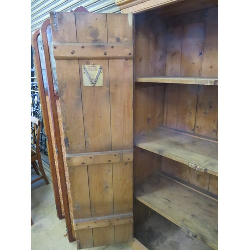 769 - A vintage pine 2-door kitchen cupboard with metal hinges, 3 fitted shelves and a vintage 