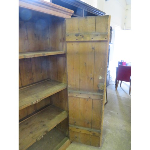 769 - A vintage pine 2-door kitchen cupboard with metal hinges, 3 fitted shelves and a vintage 