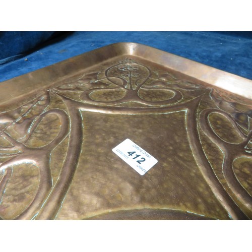 412 - A large square hammered copper Arts and Craft tray with embossed Art Nouveau design, from The Keswic... 