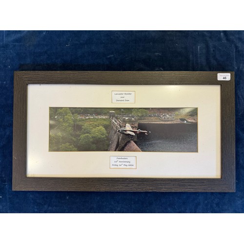 46 - A framed coloured photograph print depicting 'Lancaster Bomber over Derwent Dam' for the Dambusters ... 