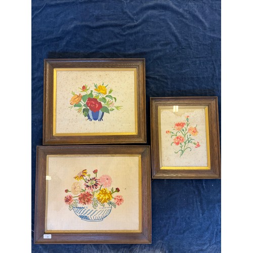 51 - Three framed vintage needlework pictures depicting flowers.