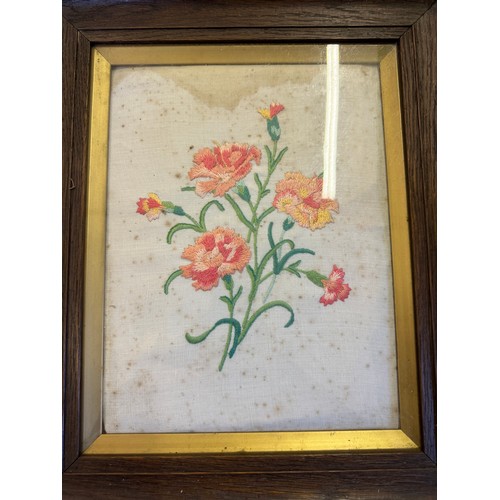 51 - Three framed vintage needlework pictures depicting flowers.