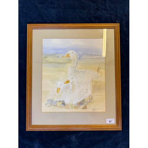 87 - A signed and framed watercolour depicting 