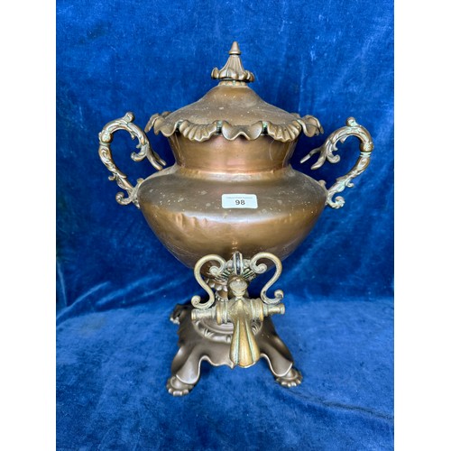 98 - A 2-handled copper Samovar with brass tap.