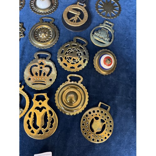 116 - Seventeen vintage horse brasses and 7 enamel saddle decorations including Wisbech Camera Club 1950-2... 