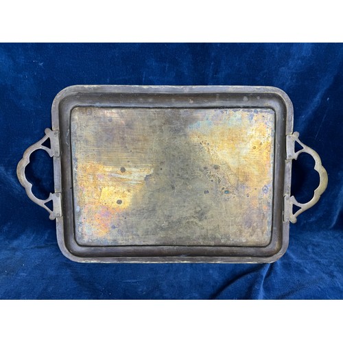 136 - A vintage brass 2-handled serving tray with elaborate etched and coloured decoration with central pe... 