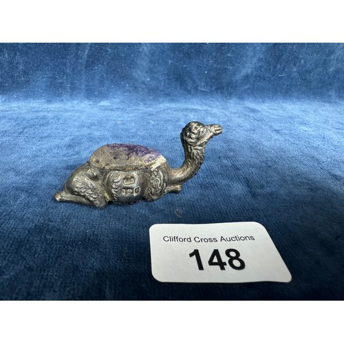 148 - An unusual small silver pincushion in the shape of a camel lying down. Hallmarked Birmingham 1906 an... 