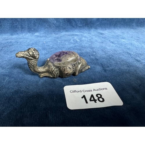 148 - An unusual small silver pincushion in the shape of a camel lying down. Hallmarked Birmingham 1906 an... 