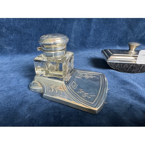 166 - A white metal inkwell of elegant proportions with geometric and foliage embossed decoration and with... 