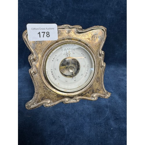 178 - A silver fronted barometer of plain design, hallmarked Birmingham