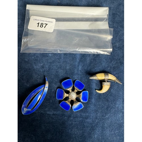 187 - 2 20th Century silver and blue enamelled brooches marked 