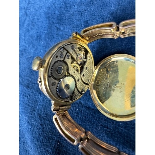 193 - A 9ct gold cased Ladies Swiss made wrist watch 9ct gold expanding bracelet by Rotherham's, London