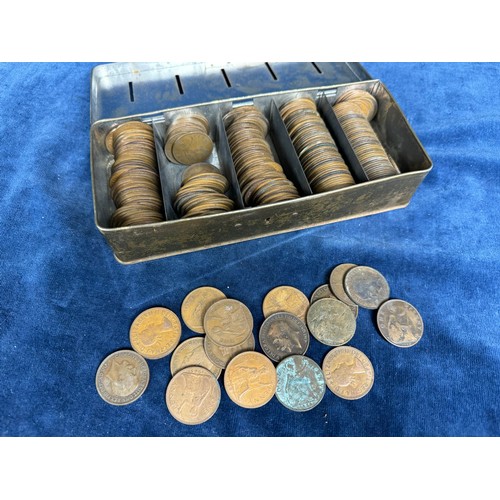 215 - A thrift box containing over 250 19th and 20th century copper One Penny Coins.