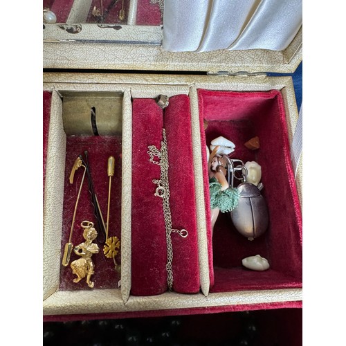 225 - A jewellery box containing costume and other jewellery including a 9 carat gold stick pin set with a... 