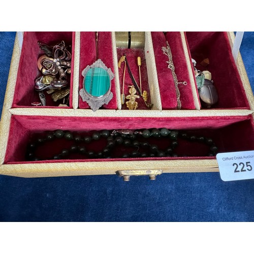 225 - A jewellery box containing costume and other jewellery including a 9 carat gold stick pin set with a... 