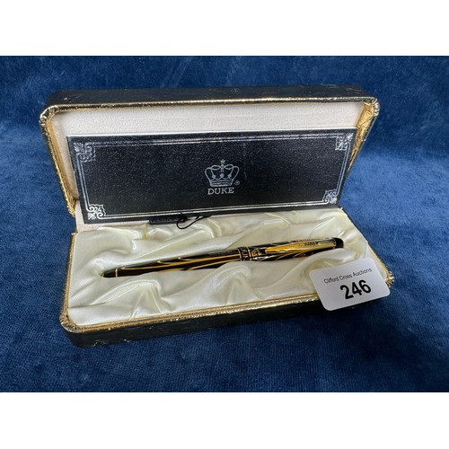 246 - A Duke 2000 presentation pen with 14 carat gold nib and gold plated, gifted to the vendor (who acted... 