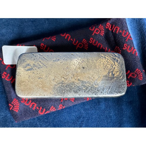 256 - A silver ingot weighing 30 troy ounces marked 