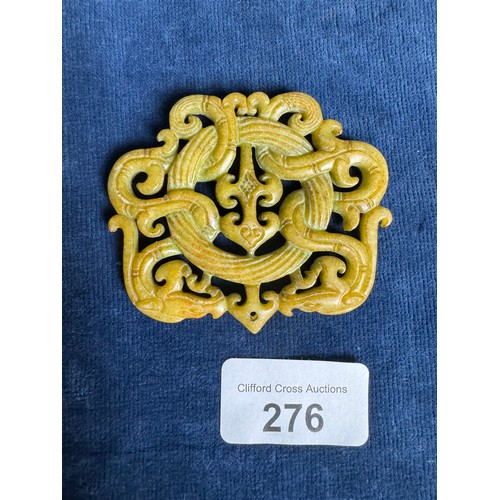 276 - A carved Chinese Jade pendant.