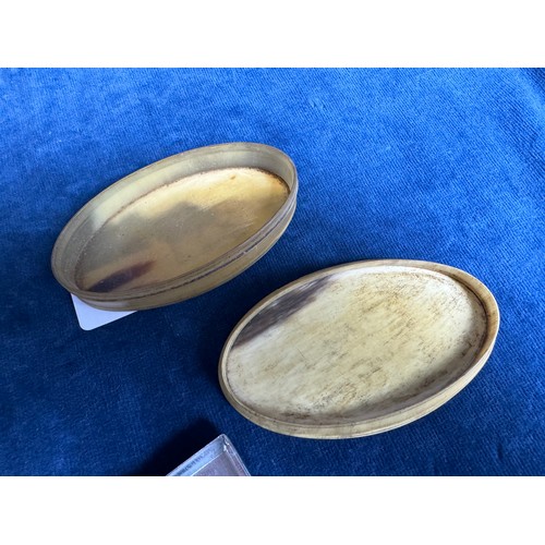 287 - A bone oval shaped snuff box together with a Motor Holyhawk Cycles cigarette case.