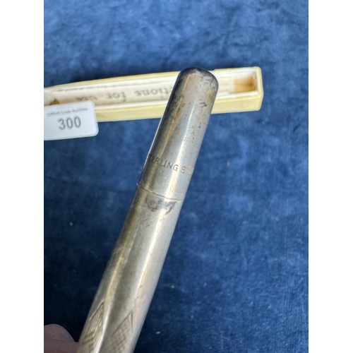 300 - A silver Propelling Pencil marked 