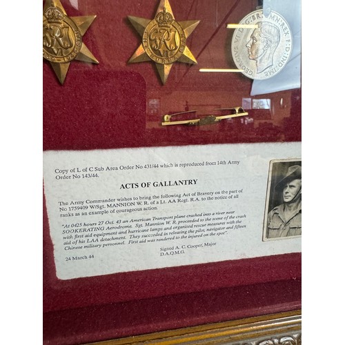 308 - A framed set of medals and pin badges for W/SGT Mannion W.R of a Lt. AA Regt. R.A including 