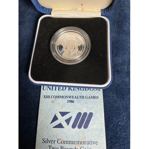 319 - A Royal Mint silver proof £2 coin set, 1989,  and a Royal Mint silver commemorative £2 coin 