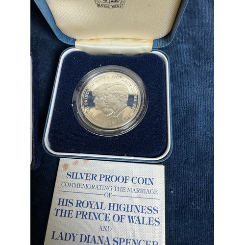 320 - A Royal Mint silver proof coin commemorating 