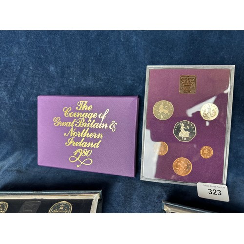 323 - 3 Royal Mint coin sets being 