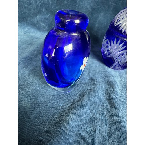 388 - A cobalt blue and clear cut Bohemian Glass  covered pot together with a small cobalt blue art vase w... 