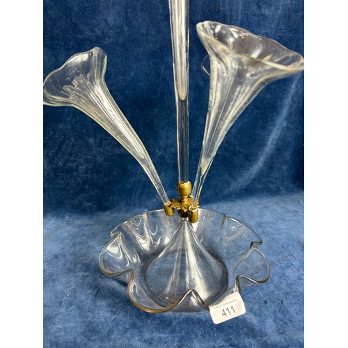 411 - A Victorian epergne with shaped glass base, three side trumpets and central vase, with brass fitting... 