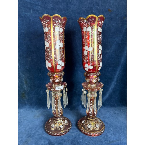 412 - A pair of Baccarat style antique candlesticks with hurricane shades, accented with hand-painted whit... 