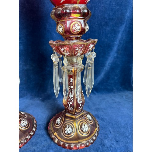 412 - A pair of Baccarat style antique candlesticks with hurricane shades, accented with hand-painted whit... 