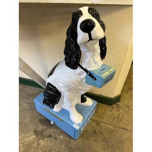 419 - An ‘RSPCA’ dog collection box, being a figure of a Spaniel dog on blue square base.