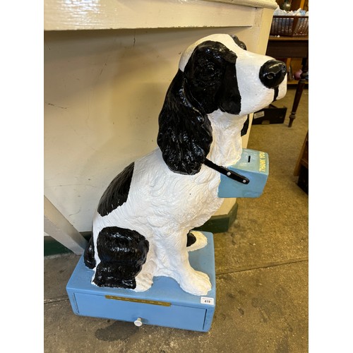 419 - An ‘RSPCA’ dog collection box, being a figure of a Spaniel dog on blue square base.